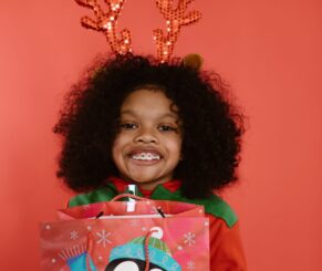 little girl with braces at Christmas.